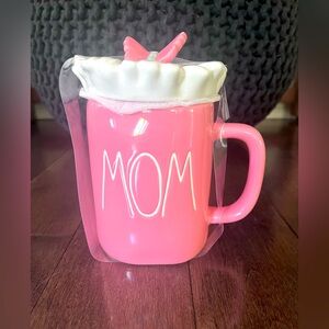 Rae Dunn pink and white “Mom” mug with floral themed lid
